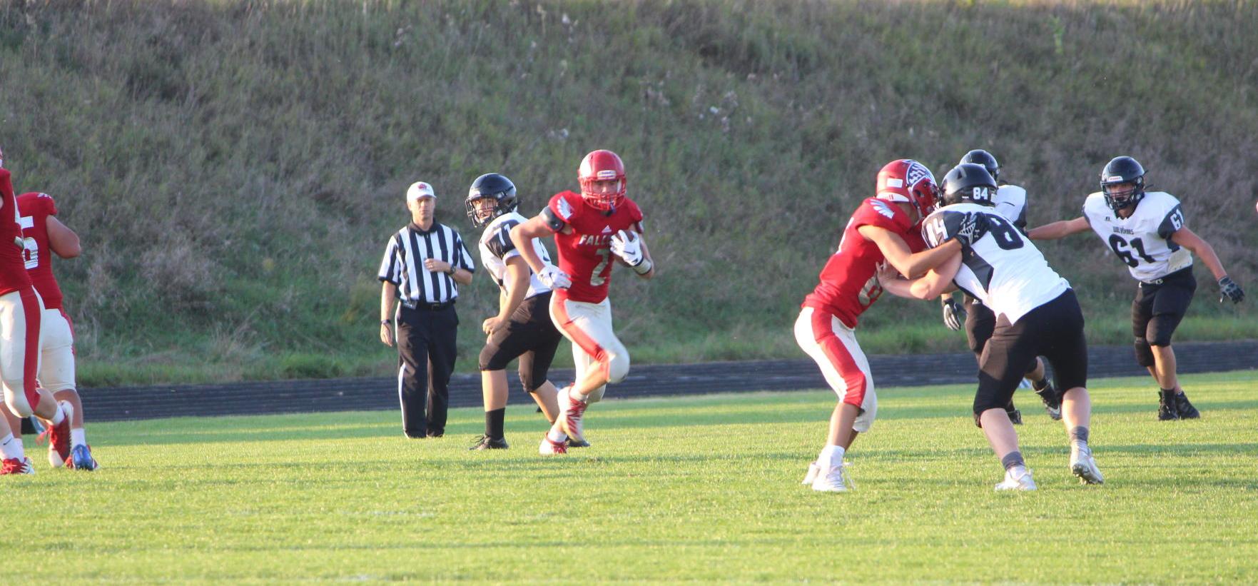 Lynott runs for a gain in yards